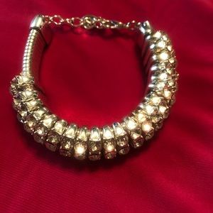 Silver rhinestone bracelet.